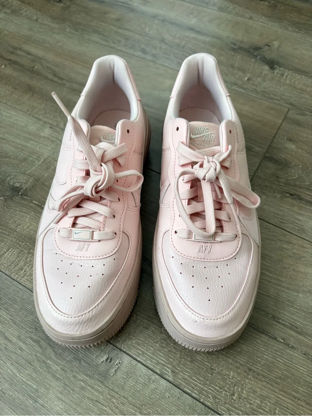 Nike Women's Low-Top Sneakers in Pale Pink